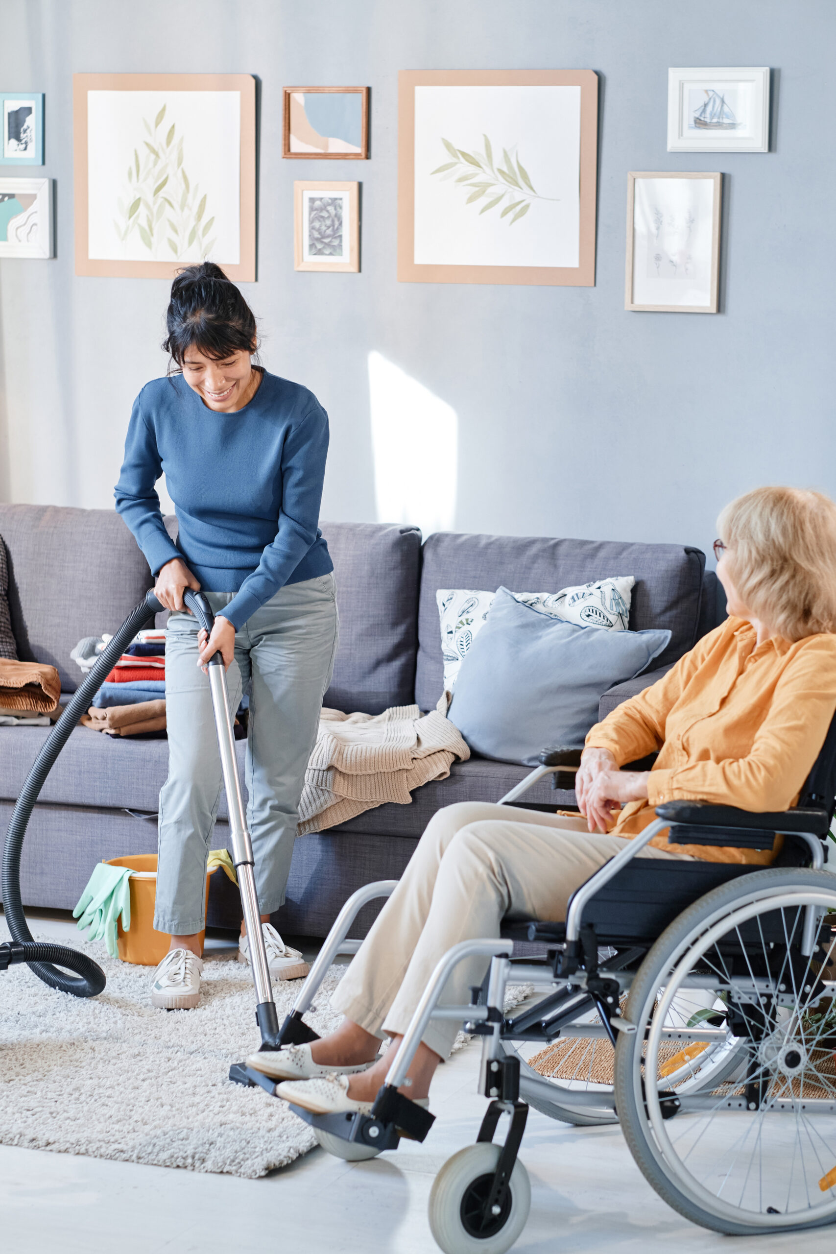 Elderly person receiving personal care services at home in Philadelphia, assisted by a compassionate caregiver.